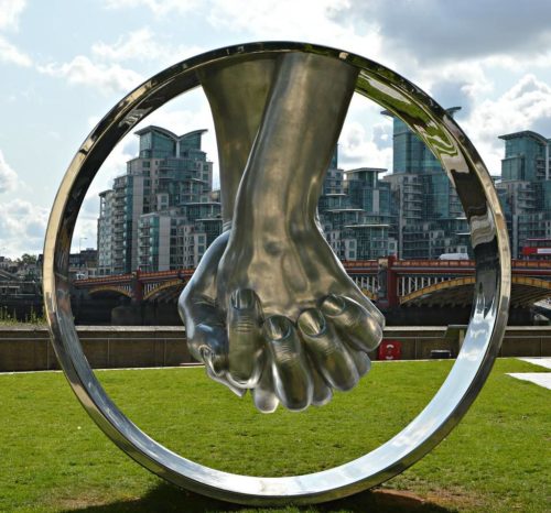 Hand on Circle Stainless Steel Metal Sculpture