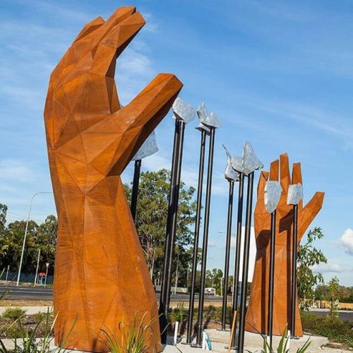 corten steel hand sculpture