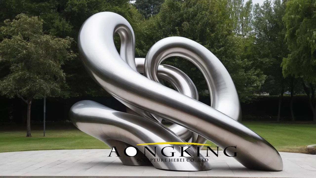curved line metal sculpture featuring abstract art